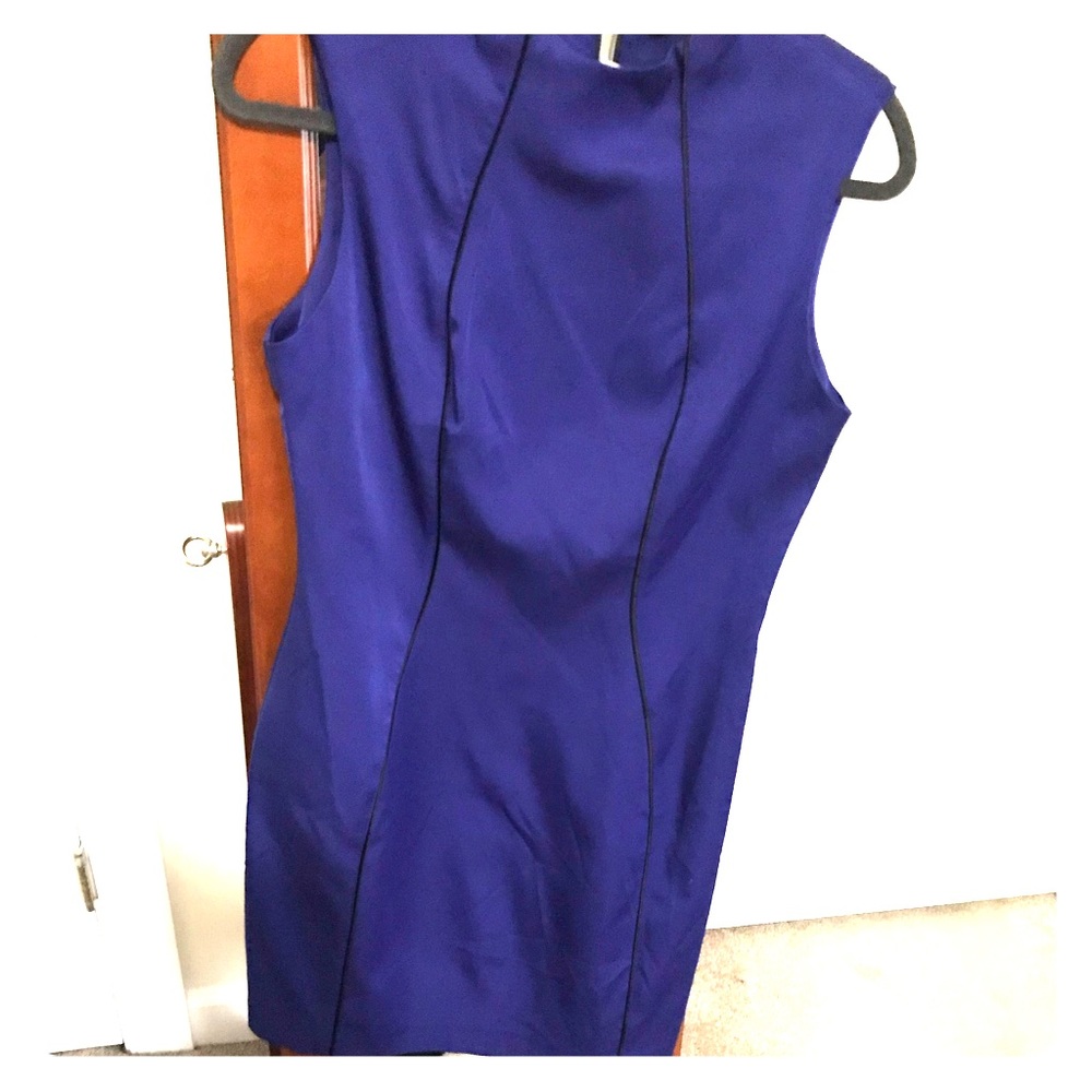 Blue mini dress with exposed zipper in the back.